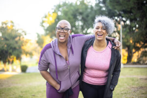 senior friends walking in nature